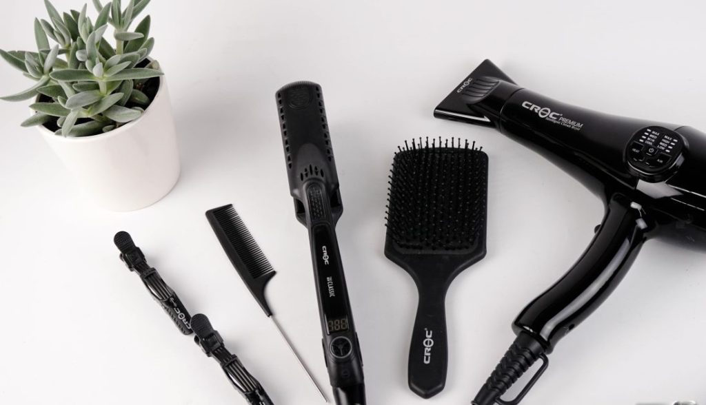 Professionele kappers aan het werk in een van de best beoordeelde kapsalons in Den Bosch bij Hair & Looks